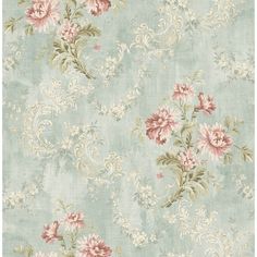 a blue floral wallpaper with pink and white flowers on the side, in an ornate pattern