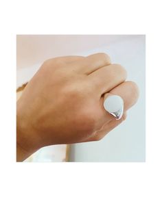 Timeless and undeniably cool, our classic Oval Signet Ring is the minimalist piece your collection’s been waiting for. Its brushed finish and clean lines bring a contemporary vibe to an iconic design. Whether you wear it on your pinky, pointer, middle, or ring finger, this versatile piece fits any look. Want to add a personal touch? We offer custom engraving to make it truly unique! Material: 14k gold, 18k gold, and sterling silver Dimensions: 10mm x 8mm Modern White Gold Signet Ring With Open Design, Modern White Gold Dome Ring As Gift, Modern White Gold Open Signet Ring, Modern White Gold Open Dome Ring, Minimalist White Gold Signet Ring For Promise, Minimalist White Ring For Formal Occasions, White Minimalist Rings For Formal Occasions, Minimalist White Rings For Formal Occasions, Modern Oval Sterling Silver Signet Ring