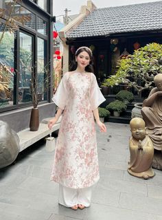 "🌿 This set includes traditional Ao Dai, white pants Style: Modern Material: Very well made with high-quality  silk Collar: halter neckline Please provide bust-waist-and hip measurements when placing your order to ensure the best fit for you. 🌿 NOTE: * Recommend gentle washing * Please contact us for any inquiries about size. We don't have an exchange policy for the wrong size * It is safe for a washer and dryer in a \"delicate\" setting. * Actual Ao Dai colors may differ up to 10% due to lightning and viewing devices. * These ao dai pants are made based on Vietnamese size; they will run smaller than American size. *3D printed ao dai: you may see some white broken fabric around the seam (collar). *There might be some chalk/ pen writings on the fabric because it is brand new, unwashed ao Vietnamese Dress Ao Dai Modern, White Embroidered Ao Dai For Spring, White Short Sleeve Ao Dai For Summer, Dark Avatar, Traditional White Ao Dai With Short Sleeves, Spring White Embroidered Ao Dai, Traditional White Ao Dai For Spring, Ao Dai White, Traditional Vietnamese Clothing