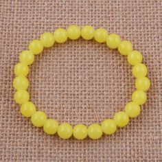 Material : Glass   Quantity: 1pcs Bead size: 8mm   NO Retail Box. Packed Safely in Bubble Bag. Elegant Yellow Stretch Bracelet With Round Beads, Elegant Yellow Beaded Stretch Bracelet, Elegant Yellow Stretch Bracelet, Yellow Bracelets With Gemstone Beads, Elegant Yellow Bracelets With 8mm Beads, Yellow Gemstone Beads Crystal Bracelet, Yellow Beaded Gemstone Bracelets, Yellow Gemstone Beaded Bracelets, Yellow Gemstone Beads Bracelet