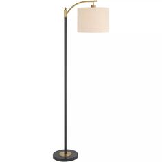 a floor lamp with a white shade on the top and a black base, against a white background