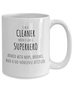 a white coffee mug that says i'm a cleaner which is like a superhero