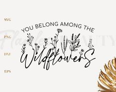 the words you belong among the wildflowers are written in black ink