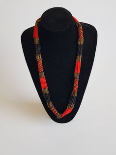 *This listing is for ALL 5 mecklaces like shown above* 100% handcrafted using original fine beads. The necklace makes a perfect gift to loved ones. **Buy multiple items and pay shipping for 1 item only.The rest ships free. Custom orders are welcome. More neckleces here; https://www.etsy.com/shop/TribalTess?ref=seller-platform-mcnav&section_id=21306083 Back to my shop; https://www.etsy.com/shop/TribalTess?ref=seller-platform-mcnav Traditional Bridal Necklace With Large Beads As A Gift, Multi-strand Beaded Chain Necklaces For Gift, Black Bohemian Necklace For Celebration, Adjustable Multi-strand Crystal Necklaces For Gifts, Adjustable Multi-strand Crystal Necklaces Gift, Adjustable Multi-strand Crystal Necklace Gift, Multicolor Round Beads Bridal Necklace As Gift, Long Beaded Necklace With Large Beads For Wedding, Adjustable Long Beaded Necklace