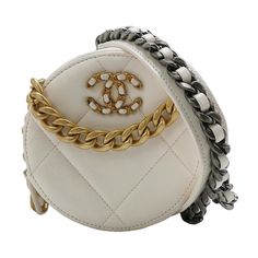 Chanel 19 Round White Cannage Leather bag These are professional photos of the actual bag offered by Luxbags. This super cute Chanel 19 Round White Cannage Leather bag is the perfect accessory for any ensemble! Its gold and silver metal chains give off that effortless glamour we all love, allowing you to stand out in the crowd! So why wait? Add this stylish bag to your wardrobe for an extra bit of pizzazz! Condition: Excellent. Hardly worn. 5"W x 5"H x 2"D 1" handle drop 23" strap drop Manufacture year: 2021 Mini Chanel, Structured Shoulder, Chanel 19, Circle Bag, Professional Photos, Bag Collection, Stylish Bag, Professional Photo, Metal Chain