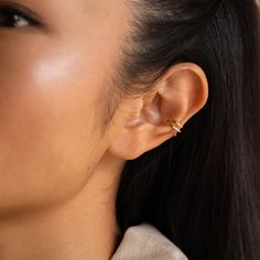 Our Claw Hoop Ear Cuff is a graceful, yet edgy interpretation of a classic ear cuff. This dainty and minimalistic piece can be worn alone or stacked with other earrings for additional style. Material: High Quality Solid 925 Sterling Silver Finish: Sterling Silver ∙ 18K Gold Featuring 9.5mm Inner and 12.5mm Outer Cuff Earrings Sold as a pair SKU: RR-ER274 Classic Pierced Ear Cuff, Modern Adjustable Cartilage Earrings For Everyday Wear, Minimalist Tarnish Resistant Ear Climbers, Classic Everyday Ear Cuff, Minimalist Tarnish-resistant Ear Climbers, Classic Everyday Single Ear Cuff, Minimalist Pierced Adjustable Ear Cuff, Minimalist Adjustable Pierced Ear Cuff, Classic Tarnish Resistant Ear Cuff For Everyday