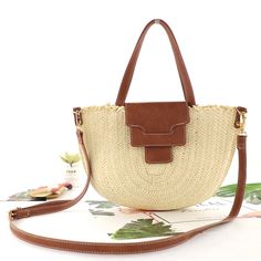 Look good, feel good with our Syria Halfmoon Raffia Shoulder Bags! Perfectly accessorize your ensemble with this stylish mix of raffia and rich brown leather colors. Be a stunna with a full armload of panache and pizzazz! SIZE: 36 cm x 24 cm (W14.2" x H9.4") Gender: WOMEN Item Type: Shoulder & Handbags Main Material: Raffia, Straw, Faux Leather Lining Material: Cotton Interior: Interior Slot Pocket. Cell phone PocketClosure Type: Hasp, Zipper Janet Jackson Concert, Look Good Feel Good, Market Bag, Woven Bag, Tote Purse, Stylish Bag, Syria, Leather Cover, Casual Bags