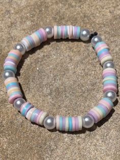 A little pastel rainbow bracelet, topped off with pearls! Cheap Rainbow Round Beaded Bracelets, Cute Cheap Pastel Beaded Bracelets, Trendy Pastel Beaded Bracelets, Handmade Pastel Beaded Bracelets, Cute Cheap Pastel Bracelets, Pastel Rainbow Bracelet, Bracelet Business, Preppy Bracelets, Rainbow Bracelet