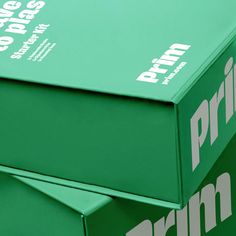 a green box with the word prima printed on it's front and side panels