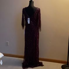 Beautiful Burgundy Beaded Flutter Sleeve Dress Is Approximately 60” Long From The Center Of The Back. New With Tags, Never Worn. Was Purchased For Potential Mother Of The Bride Dress. Formal Beaded V-neck Evening Dress, Beaded Floor-length Cocktail Dress, Beaded Evening Dress For Holiday, Holiday Beaded Evening Dress, Beaded Holiday Evening Dress, Bride Dress Color, Formal Gown, Mother Of The Bride Dress, Flutter Sleeve Dress