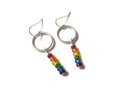 "Love these gorgeous colorful rainbow bead earrings! One of a kind earrings! They will go with so many outfits and make a beautiful statement! These earrings dangle about 2\" long and lightweight. I can make more of these earrings if you need more pairs. Just message me! A great gift for that special someone who has everything! Check out my other mixed metal earrings! https://www.etsy.com/shop/HeidiKindFinds?ref=hdr_shop_menu&search_query=mixed+metal+earrings" Rainbow Hypoallergenic Hoop Earrings, Hypoallergenic Rainbow Hoop Earrings, Rainbow Nickel-free Dangle Hoop Earrings, Nickel-free Small Hoop Rainbow Earrings, Nickel-free Rainbow Dangle Hoop Earrings, Rainbow Dangle Earrings For Everyday, Rainbow Dangle Hoop Earrings With Ear Wire, Rainbow Dangle Jewelry For Everyday, Everyday Rainbow Dangle Jewelry