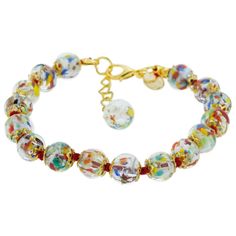 The trendy Murano Glass Bracelet handcrafted with care and passion by the world-famous Murano glass artisans features rich colors, swirling patterns, and playful sparkly look. To achieve these effects, the glass masters used ancient Sommerso technique, where colored threads of glass are submerged in a layer of transparent glass, resulting in the intricate play of color and light. The copper particles infused into glass create subtle golden glow under all lighting conditions. Stylish, artistic, a Elegant Glass Beaded Bracelets, Elegant Adjustable Glass Crystal Bracelet, Elegant Multicolor Adjustable Crystal Bracelet, Elegant Handmade Glass Crystal Bracelet, Elegant Handmade Crystal Glass Bracelet, Adjustable Multicolor Crystal Glass Bracelet, Adjustable Multicolor Glass Bracelets, Multicolor Glass Bracelet Jewelry, Colorful Glass Bead Round Bracelets