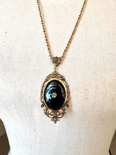 This is a very pretty necklace, the chain is really unique. The total length is approx. 24" and the pendant is approx 2.5" in length. Victorian Enamel Locket Jewelry, Elegant Enamel Cameo Jewelry, Oval Enamel Locket Necklace, Oval Locket Necklace In Enamel, Formal Enamel Locket Jewelry, Elegant Enamel Necklace With Chain, Formal Enamel Medallion Necklace, Enamel Chain Necklace For Gift, Victorian Gold Enamel Necklace