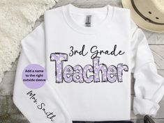 An adorable sweatshirt or t-shirt for the 3rd/third grade teacher. Customize by adding a name on the sleeve.  Great to wear while teaching.  SWEATSHIRT PRODUCT DESCRIPTION: Ideal for any situation, a unisex heavy blend crewneck sweatshirt is pure comfort. These garments are made from polyester and cotton. This combination helps designs come out looking fresh and beautiful. The collar is ribbed knit, so it retains its shape even after washing. There are no itchy side seams on these sweaters.  * Customizable Long Sleeve T-shirt For School Spirit, School Long Sleeve T-shirt With Name Print, Long Sleeve Tops For End Of School Year Events, Personalized Crew Neck Tops For Back To School, Long Sleeve Tops For School Events, Long Sleeve Cotton Top For School Events, Long Sleeve Cotton Tops For School, Cotton Long Sleeve Tops For School Events, End Of School Year Long Sleeve T-shirt