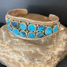 (eBay) Navajo Sterling Silver Blue Kingman Turquoise Cuff 2 Row Bracelet 16Stone 12691 Southwestern Style Stamped Blue Bracelets, Bohemian Stamped Blue Bracelets, Blue Stamped Bohemian Bracelets, Bohemian Blue Stamped Bracelets, Southwestern Style Turquoise Cuff Bracelet, Southwestern Style Round Turquoise Cuff Bracelet, Artisan Blue Stamped Bracelets, Southwestern Blue Cuff Bracelet With Patina, Southwestern Blue Patina Cuff Bracelet