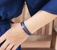 "This handmade double wrap cobalt blue leather bracelet is made of genuine leather and silver plated Swarovski bead. It has a super safe hypoallergenic magnetic clasp. Very comfortable & easy to wear. Looks great with t-shirt, jeans or boho dress! ✧ 100% Handcrafted ✧ Absolutely Unique ✧ Hypoallergenic ✧ High Quality Genuine Leather Inlay ✧ Gift-ready in a cute craft box ❤ Ready to ship in 1-2 business days ❤ Average shipping time (US/Canada/UK) 5-10 business days ❤ Tracking Available BeGenu Elegant Blue Leather Bracelet For Gift, Elegant Blue Wrap Bracelet As Gift, Elegant Blue Wrap Bracelet As A Gift, Elegant Blue Adjustable Leather Bracelet, Elegant Adjustable Blue Leather Bracelet, Jewelry For Couples, Bracelets Braided, Leather Inlay, Bracelets Boho