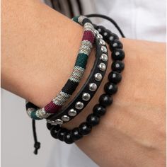 An Earthy Compilation Of Black Wooden Beads, A Silver Studded Black Leather Band, And A Colorful Strand Of Textile Fabric Layers Around The Wrist For An Adventurous Fashion. Features An Adjustable Sliding Knot Closure. Sold As One Individual Bracelet. Adjustable Black Bracelet With Silver Beads, Black Bohemian Leather Bracelet With Round Beads, Bohemian Black Leather Bracelet With Round Beads, Black Beaded Bohemian Leather Bracelet, Adjustable Black Leather Bracelet With Round Beads, Black Beaded Bracelets With Silver Beads For Party, Festival Black Braided Bracelets With Round Beads, Black Braided Bracelet With Round Beads For Festivals, Wired Jewelry