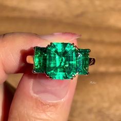 Center Stone Details:- → Type: Lab Grown Emerald → Shape: Emerald Cut → Size: 10X9MM  → Weight: 3 carat approx (can differ a bit as the stones are cut and polished by hand) → Color: Colombian Green Side Stone Details:- → Type: Lab Grown Emerald → Shape: Emerald Cut → Size: 7X5MM  → Weight: 2 carat approx (can differ a bit as the stones are cut and polished by hand) → Color: Colombian Green Metal Details:- → 925 Sterling Silver  → 14K Solid White, Yellow or Rose Gold. → 18K Solid White, Yellow or Gemstone Engagement Ring, Emerald Cut Engagement, Gold Luxury, Vintage Style Rings, Emerald Engagement Ring Cut, Gemstone Engagement, Creating Jewelry, Emerald Stone, Gift Ring