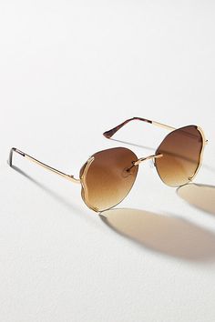 Plastic Wipe clean with a soft cloth Imported | Flora Rimless Circle Sunglasses by I-SEA in Gold, Women's, Plastic at Anthropologie Circle Sunglasses, Gold Sunglasses, Cleaning Wipes, Anthropologie, Sunglasses, Gold