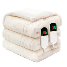 three heated blankets stacked on top of each other with thermometers in them