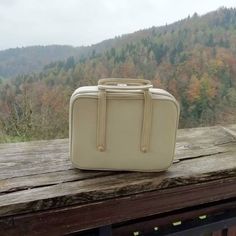 You are looking at very nice vintage woman bag made in 70s. The bag has an accordion style. It is made of beautiful white leather. The bag is in great vintage condition with some marks of daily use, especially in the bottom of the bag (please look the picture). Inside of the bag is in adorable red colour. The bag is very nice looking. It could be very special gift. Dimensions: Height: 22 cm or approx. 9 inch Width:29 cm or 11, 4 inch. Delivery worldwide. If you are interested in more my items, p Rectangular Cream Box Bag For Travel, Vintage White Rectangular Bag, White Vintage Rectangular Bag, White Rectangular Vintage Bag, Vintage Satchel Box Bag For Travel, Vintage White Bags For Travel, Vintage Rectangular Box Bag For Travel, Retro Cream Rectangular Shoulder Bag, Vintage White Travel Bag