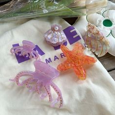 Complete your mermaid aesthetic look by enhancing your hairstyle with these adorable ocean-themed hair claw clips Material: Plastic Iridescent Hair, Cr7 Jr, Ocean Aesthetic, Mermaid Aesthetic, Hair Claw Clips, Bottle Jewelry, Hair Claw Clip, Claw Clips, Bottle Bag