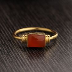 18K Gold Plated on 925 Sterling Silver. Metal : Solid Sterling Silver with 925 Stamp. Stone - Natural Carnelian  Ring Weight - 2.3 gm. Stone Size - 5x7mm fancy Ring Baguette, Baguette Ring, Carnelian Ring, Ring Birthstone, Men's Ring, Ring Gemstone, Ring Gold, Birthstone Ring, Ring Handmade