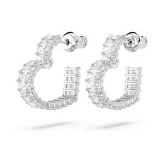 Go for refined elegance with these small heart-shaped earrings from the Matrix family. The passionate design combines a rhodium-plated setting with a full pavé of baguette-cut clear crystals, and a hooped look that will instantly draw attention. A perfect gift for yourself or a loved one, these earrings can be worn on their own or matched with a necklace from the same family. Details: Article no.: 5653170 Collection: Matrix Length: 3/4 inches Width: 3/4 inches Material: Rhodium plated, Zirconia Swarovski Heart Earrings, Swarovski Jewelry Earrings, Shiny Earrings, Swarovski Heart, Silver Diamond Earrings, Heart Earring, Heart Hoop Earrings, Earrings Heart, Butterfly Earrings Stud