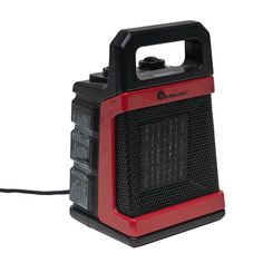 a red and black radio sitting on top of a table