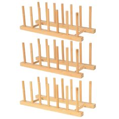 three wooden pegs are stacked on top of each other