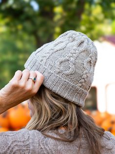 A warm cap to knit in three sizes (S/M/L) that will be much appreciated by any family member when the cold winds blow. Simple cable crosses in a vertical pattern create a neat, modern motif that is engaging to knit and delicious to wear. Knit in a round tightly twisted yarn for crisp stitch definition and a snug fit; for a softer texture and fit, work in a relaxed yarn or fiber blend. May be worked with a shorter, single brim (instructions included). Samples shown are size M (hers) and size L (h Swirl Hat, Blanket Cardigan, Charming Eyes, Halloween Kit, Cable Hat, Vertical Pattern, Aran Weight Yarn, Lace Sweater, Dk Weight Yarn