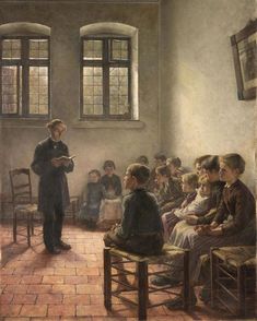 a man standing in front of a group of children