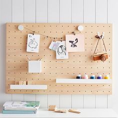 a peg board with some craft supplies on it