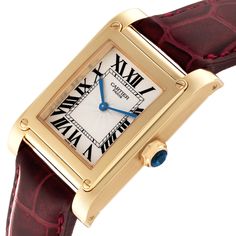 Cartier Tank a Vis Privee CPCP Collection Yellow Gold Mens Watch W1529451. Manual winding movement. 18k yellow gold case 27.0 x 30.0 mm. Octoganal crown set with faceted blue sapphire. . Scratch resistant sapphire crystal. Silvered guilloche dial with black Arabic numerals. Sword-shaped blued steel hands. Secret Cartier signature at VII. Custom burgundy leather strap with Cartier 18k yellow gold deployant clasp. Cartier Ballon Bleu, Gold Watch Men, Cartier Tank, Vintage Rolex, Gold Case, Swiss Watches, Luxury Watch, Sapphire Crystal, Dark Red