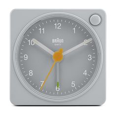 an analog clock with two hands and the time is 11 00 on it's face