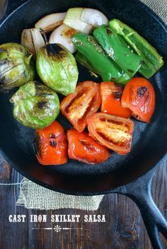 an iron skillet filled with assorted vegetables