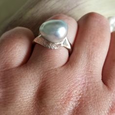 "* This beautiful pearl ring would be a wonderful gift to a bride on her wedding day, or perhaps the mother of the bride or groom! The silvery gray pearl is is unique and beautful, giving this ring tons of understated charm and elegance. This ring is very sturdy and well-made, and it shows! * This piece weighs 6.7 grams, and is stamped \"14K\" inside the shank. The pearls measure approximately 12.6 mm x 12.9 mm This ring is a US size 7. Please message us about sizing options prior to purchase! * Modern Pearl Wedding Ring, Silver Akoya Pearl Rings For Formal Occasions, Modern Pear-shaped Rings For Gifts, Handmade White Gold Pearl Ring For Formal Occasions, Unique White Gold Pearl Ring For Formal Occasions, Silver Akoya Pearl Ring For Anniversary, Fine Jewelry Tahitian Pearl For Wedding, Elegant Tahitian Pearl Ring As A Gift, Luxury Silver Tahitian Pearl Ring