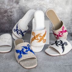 Beautiful sandals made of Linen, Hand-embroidered by Mexican indigenous women who pay incredible attention to details, features two ALEBRIJES birds embroidered on top of each sandal, It has a cushioned footbed for comfort. Wear it with mid-length dresses, skirts, pants, or simply for a day on the beach.We make slow-fashion items, one by one, with patience and love! Details:* Linen Gray* Embroidery Electric Blue Color* Flat* Handmade* Hand Embroidered* Imported from MexicoPerfect as a gift Flat Embroidered Sandals For Beach, Embroidered Closed Toe Sandals For Beach, Embroidered Flat Sandals For Summer, Traditional Embroidered Sandals For Summer, Embroidered Slip-on Sandals For Vacation, Multicolor Embroidered Open Toe Sandals For Summer, Gray Embroidery, Fancy Sandals, Honeymoon Style