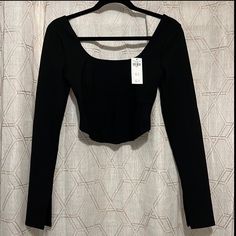 Black, Long Sleeve Corset Crop Top. Brand New With Tags. Very Good Quality. Chic Long Sleeve Scoop Neck Top For Spring, Winter Stretchy Long Sleeve Scoop Neck Top, Winter Stretch Long Sleeve Top With Scoop Neck, Stretch Scoop Neck Long Sleeve Top For Winter, Stretch Crew Neck Long Sleeve Top For Night Out, Fitted Winter Crop Top, Fitted Crew Neck Long Sleeve Top For Night Out, Fitted Crew Neck Top For Night Out, Fall Crop Top With Scoop Neck And Stretch Fit