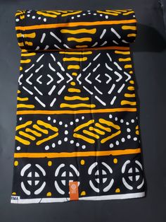 DESCRIPTION Black, Yellow and White Multicolor African Ankara Fabric. This is high quality African print is 100% cotton and it's 45 inches wide. It is used for making African Clothing, African quilts, & For Home decoration. FYI: Print is Double sided. The listing is for Per yard, 6yards and Headwrap For Each piece of fabric measures: 34-36in by 45in for 1yard 105-108in by 45in for 3yards 210-216in by 45in for 6yards 70in by 22in for Head wrap If you purchase more than one yard, you will receive African Quilts, Clean And Press, Fabric Patterns Design, Head Wrap Headband, African Ankara, African Print Fabric, Ankara Fabric, Mixing Fabrics, Head Wrap