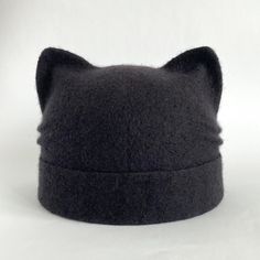 100% wool hat with a double brim is an indispensable accessory in the cold season. The felted hat from merino wool is warm, cozy and soft.  Cat beanie with ears is a perfect accessory to create a unique look. Hat with ears great gift for cat owners. This item is made to order and ready to ship in 3-5 business days after payment. Please choose size and color. ON THE first PICTURE size M. Circumference of your head is approximately 22,5 inches (57 cm), length approx 7.7+2 inch (19,5 cm+lapel 5 cm) Cheap Hats With Cat Design, Winter Fur Felt Hat, Fitted Winter Hat With Cat Ears, Black Winter Felt Hat, Black Felt Cap For Winter, Adjustable Felt Beanie For Winter, Casual Cat Ears Winter Hats, Casual Winter Fur Felt Hat, Casual Fur Felt Hat For Winter