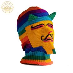 Embrace the winter chill with our Winter Wakollo Hat, a symbol of warmth and style. Crafted in Cusco, this hat is a true work of art, meticulously handwoven with the finest llama wool to keep you cozy in the most authentic Andean fashion. Product Features: Material: Made with the utmost care, the Winter Wakollo Hat is woven from the luxurious and insulating wool of the llama, ensuring both comfort and style during colder seasons. Size: Designed in a standard size, this hat offers a perfect fit f Casual Winter Beanie For Festivals, Casual Winter Festival Beanie, Quirky Handmade Winter Hats, Handmade Yellow Beanie For Winter, Peruvian Mask, Knitted Mask, Face Pulls, Knitted Balaclava, Andes Mountains