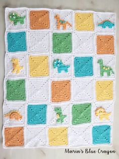 a crocheted baby blanket with different colors and animals on it's squares