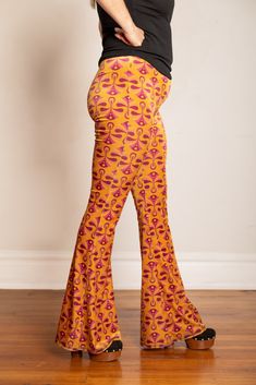 *These pants are Ready to Ship* Click to view Size Chart Inspired by Art Deco, we designed this print in collaboration with Flare Street. These velvet flares are super versatile and the perfect statement pants all year round. The lustrous Gold print can be dressed up or worn casually. SIZE CHART:Model is a 31" wearing a size LargeBe sure to check the size chart before ordering, these have a lot of stretch but do run a bit small. Say Hello To Flare Street! Let's spread the Flare-Love! Our flares Statement Pants, Velvet Flares, Gold Velvet, Gold Print, Melbourne Australia, Fabric Store, Say Hello, Quality Fabric, Two Piece Pant Set