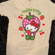 Questions? Leave A Comment Below! Sanrio Shirt, Cutecore Clothes, Kawaii Tshirt, Hello Kitty Strawberry, Strawberry Graphic, Hello Kitty Shirt, Y2k Graphic Tees, Tee Outfits, Kawaii Shirt