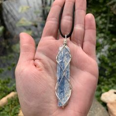 "☾ Large Blue Kyanite Necklace ☾ High quality, large blue kyanite in its raw form in a secure & subtle setting that highlights the stone These pendants come in pure copper or sterling silver. Choose from an adjustable faux leather chord, a matching 18\" copper chain, a matching 18\" sterling silver chain or get just the pendant. ⭐️Faux Leather Chord Options: Choose from black, dark brown or tan. These chords are also tied to be adjustable so you can wear it at your desired length! Need a longer Wire Shapes, Blue Kyanite Crystal, Kyanite Necklace, Kyanite Jewelry, Wire Pendants, Kyanite Crystal, Blue Crystal Necklace, Wrapping Jewelry, Diy Pendant Necklace