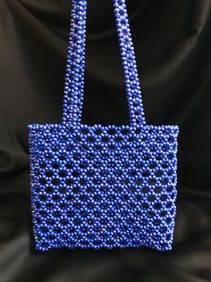 My bags are completely handmade. I design with natural beads and lovingly. This size is perfect for carrying your phone and wallet. I can produce bags according to your request. Details Handmade product, Only produced in 1 day, Suitable for daily use * Materials Crystal beads I send my shipment free of charge by express shipping. Canada: 3-7 business days United States: 3-7 business days North America: 3-7 business days Europe: 3-7 business days Crystal Bead Bag, Produce Bags, Beaded Bag, Crystal Blue, Handmade Bag, Bag Vintage, Beaded Bags, Natural Beads, Blue Beads