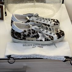 This Is A Pair Of Brand New Golden Goose Superstar Sneakers In A Fun Leopard Print Size 38. Purchased Them From Neiman Marcus. Dust Bag Included. Can’t Take Them Back So My Loss Is Your Gain! Golden Goose Sneakers Leopard, Leopard Golden Goose, Cute Golden Goose, Golden Goose Style, Women Shoes Sneakers, Fur Sneakers, Golden Goose Superstar, Leopard Print Sneakers, Preppy Shoes