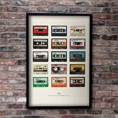 an old fashioned cassette player poster on a brick wall