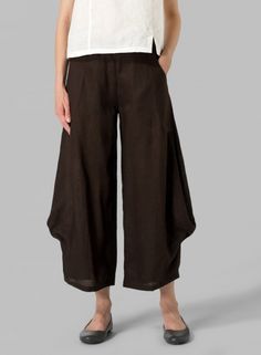 Linen Flared Leg Crop Pants Elegant Loose Fit Bottoms For Fall, Chic Solid Color Relaxed Fit Harem Pants, Elegant Baggy Wide-leg Harem Pants, Elegant Baggy Pants With Pockets, Chic Wide-leg Harem Pants For Fall, Chic Fall Wide-leg Harem Pants, Elegant Loose Fit Harem Pants, Chic Ankle-length Harem Pants For Fall, Chic Baggy Ankle-length Harem Pants